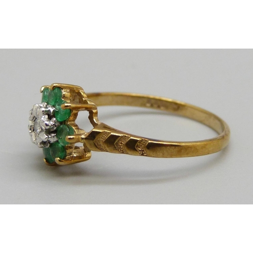 929 - A 9ct gold, emerald and diamond cluster ring, 1.6g, M