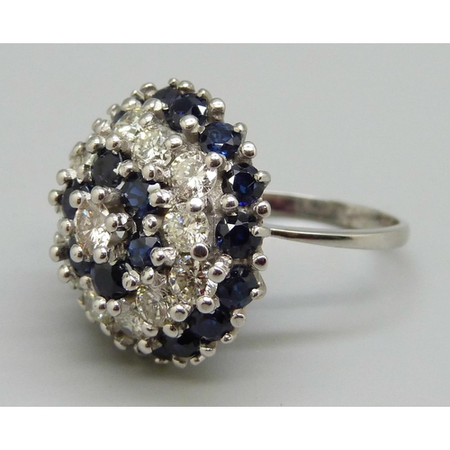 939 - A large 18ct white gold, sapphire and diamond cluster ring, 22x 0.10ct sapphires, plus 13 diamonds, ... 