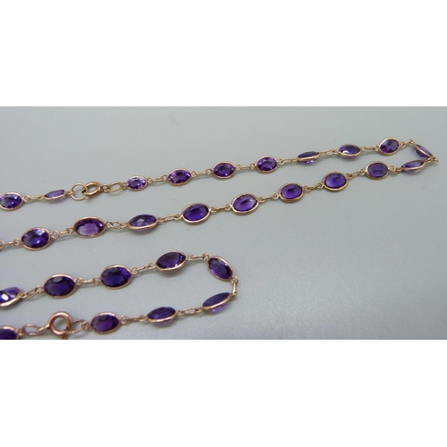 940 - A 9ct gold and amethyst necklace and matching bracelet, 11.5g, necklace 44cm and bracelet 18cm