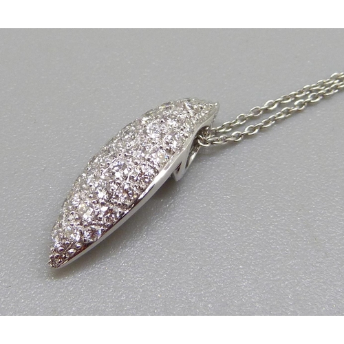 942 - An 18ct white gold pendant and chain, 39 brilliant cut diamonds, total diamond weight 1ct, 3.3g