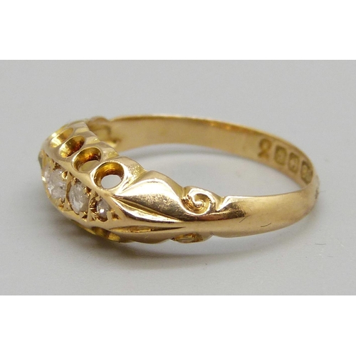 943 - An Edward VII 18ct gold and five stone diamond ring, Birmingham 1906, 2g, K