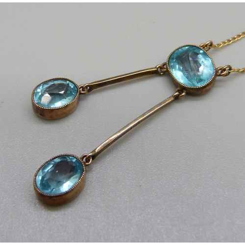 956 - A 9ct gold and blue stone necklet, 3.2g