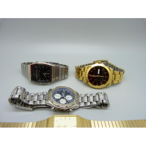 963 - Four Seiko wristwatches and a Lorus