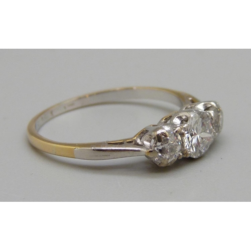 968 - An 18ct gold, platinum and three stone diamond ring, brilliant cut diamonds, approximately 0.65ct to... 