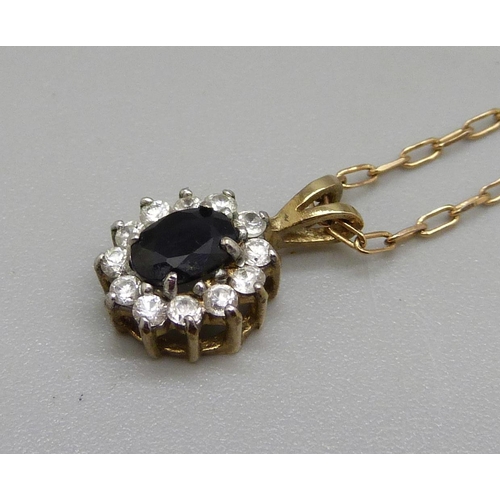 984 - A 9ct gold cluster pendant and chain, 2.5g