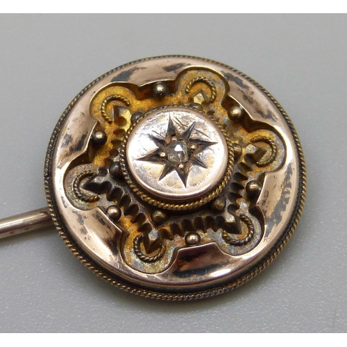 985 - A Victorian yellow metal and old cut diamond stick pin, 3.6g, diameter 18mm