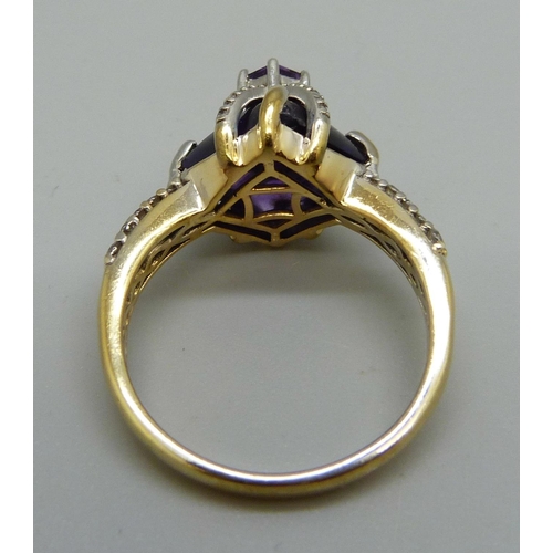 991 - A large silver gilt, white and purple stone cocktail ring, W