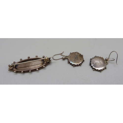 993 - A Victorian silver brooch, Birmingham 1896, and a pair of earrings