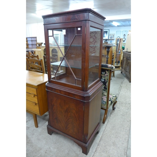 105 - A mahogany display cabinet