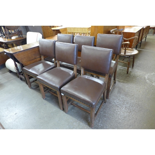 161 - A set of six Arts and Crafts oak and brown leather upholstered chairs