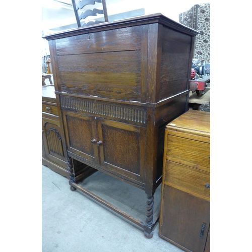 178 - An oak barleytwist cocktail cabinet