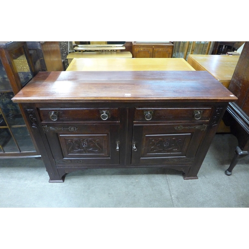 182 - An Arts and Crafts mahogany sideboard