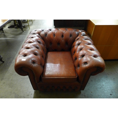 184 - A Chesterfield brown leather club chair