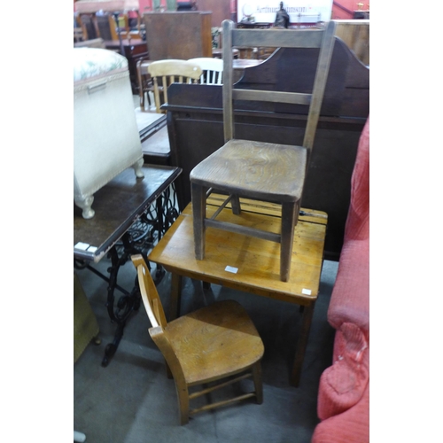 233 - A child's pine school desk and two chairs