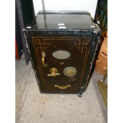 262 - A Victorian cast iron T Withers & Sons Ltd., Wolverhampton safe, with key, 68cms h, 47cms w, 48cms d