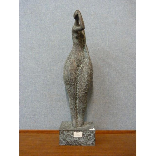 377 - A bronze abstract figure of a lady, 62cms h