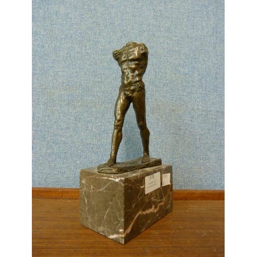 378 - A bronze figure of a torso, on black marble socle, 33cms h