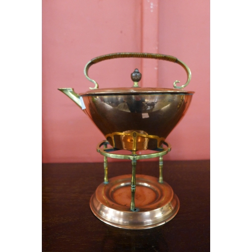 5 - An Arts and Crafts W.A.S. Benson copper and brass spirit kettle on stand