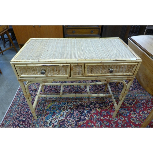 61 - A bamboo and rattan two drawer desk