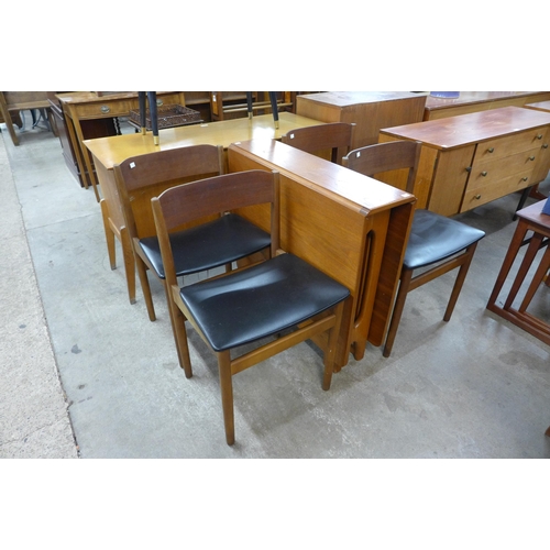 73 - A McIntosh teak drop leaf table and four chairs