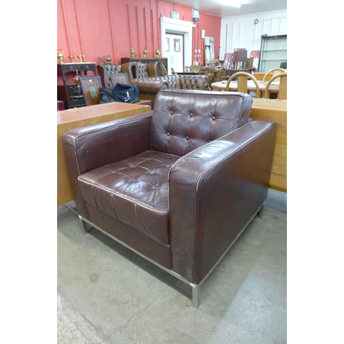 84 - A Knoll style chrome and brown leather armchair