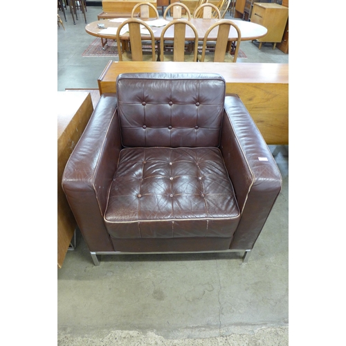 84 - A Knoll style chrome and brown leather armchair