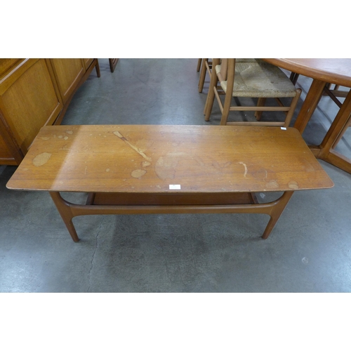 86 - A Jentique teak coffee table