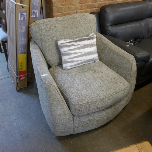 1422 - A champagne upholstered armchair
