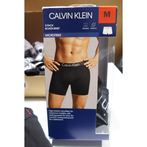3124 - Men's branded boxer shorts including Calvin Klein, Pringle and Penguin, various sizes * this lot is ... 