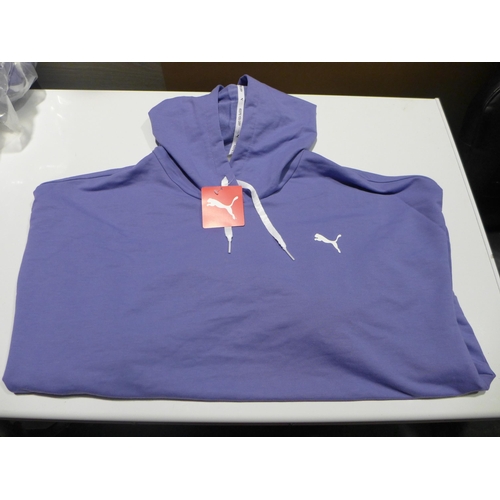3160 - 4 Women's XL Hazy Blue cropped Puma hoodies * this lot is subject to VAT