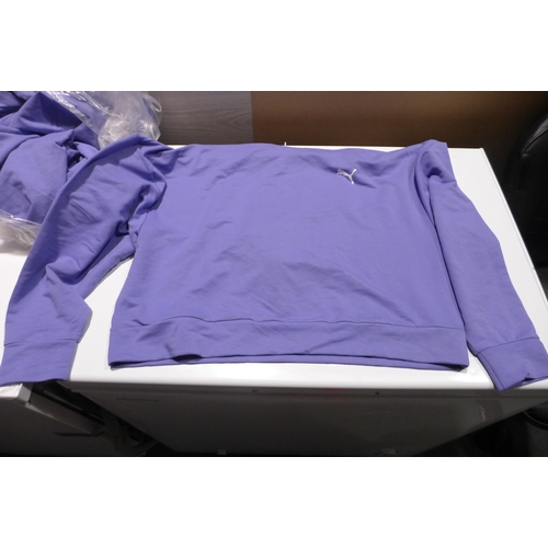 3160 - 4 Women's XL Hazy Blue cropped Puma hoodies * this lot is subject to VAT