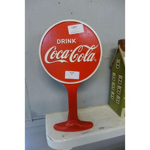 1307 - A cast iron 'Coca-Cola' door stop, H 31cms (STM5505)   #