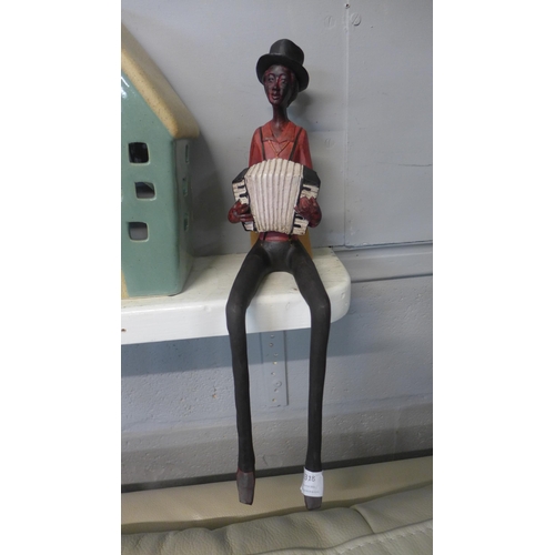 1318 - A sitting jazz band squeeze box, H 40cms (026312)   #