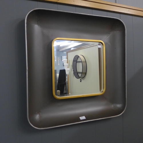 1384 - An industrial style grey and gold square mirror