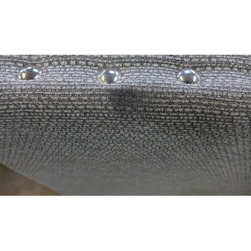 1437 - A CoCo silver upholstered and studded LHF corner sofa * this lot is subject to VAT