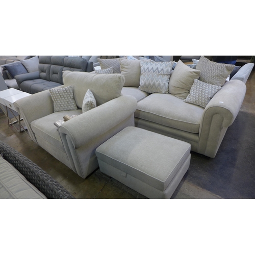 1439 - A champagne upholstered four seater sofa, loveseat and footstool