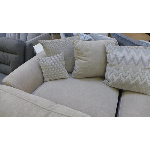 1439 - A champagne upholstered four seater sofa, loveseat and footstool