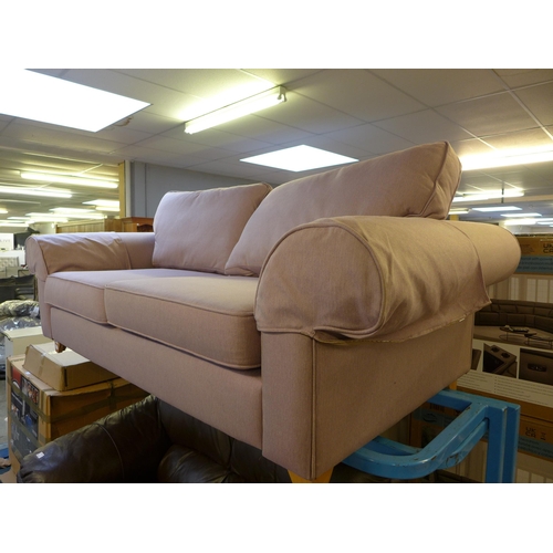 1537 - A lilac upholstered three seater sofa