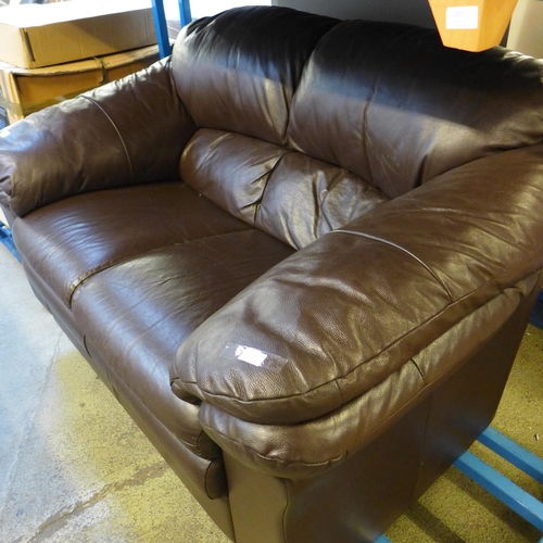 1538 - A brown leather two seater sofa