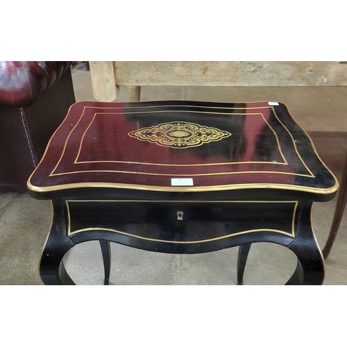 37 - A French Napoleon III ebonised and brass inlaid lady's vanity dressing table