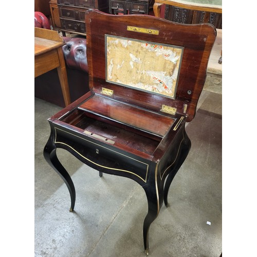 37 - A French Napoleon III ebonised and brass inlaid lady's vanity dressing table