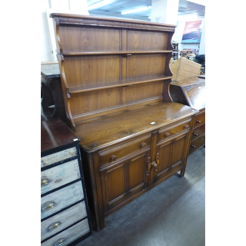 205 - An Ercol Golden Dawn elm dresser