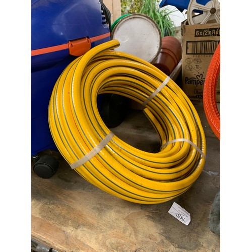 2121 - Black and Decker hose pipe and reel with other hose pipe