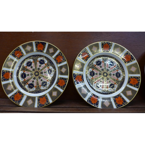 601 - Four Royal Crown Derby 1128 Imari pattern plates, 21cm