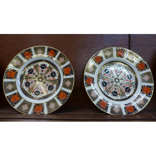 601 - Four Royal Crown Derby 1128 Imari pattern plates, 21cm