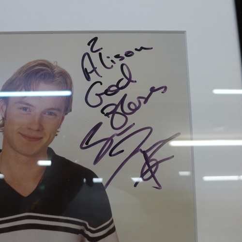 604 - A Ronan Keating autographed photo, with Boyzone live tag