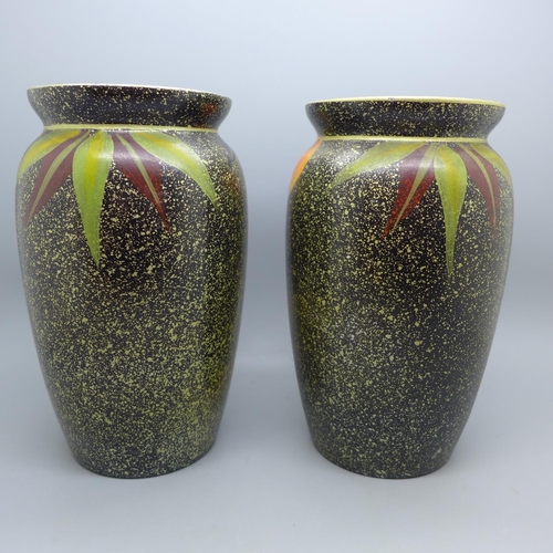 605 - A pair of Athol & Sons vases, 18cm