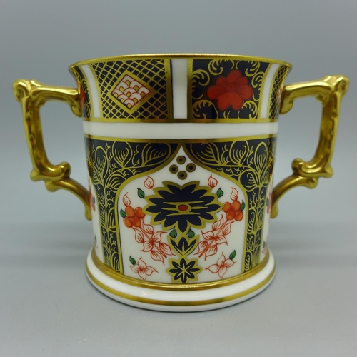 631 - A Royal Crown Derby 1128 Imari pattern twin handled loving cup