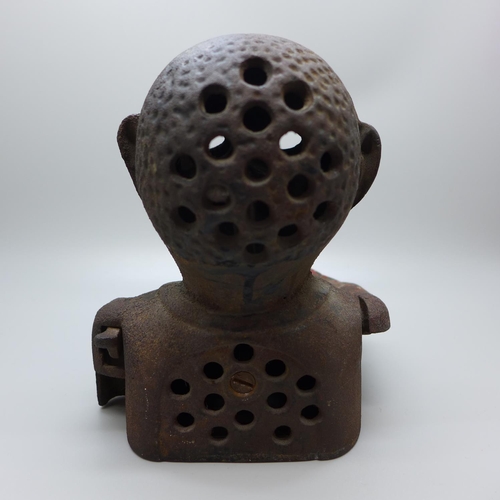 649 - A cast iron Jolly money bank