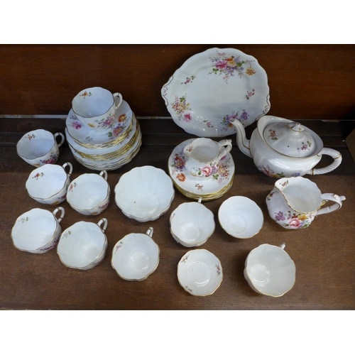 669 - A Royal Crown Derby Posies tea set, eight setting, with milk jug, sugar, sandwich plate, tea plates ... 